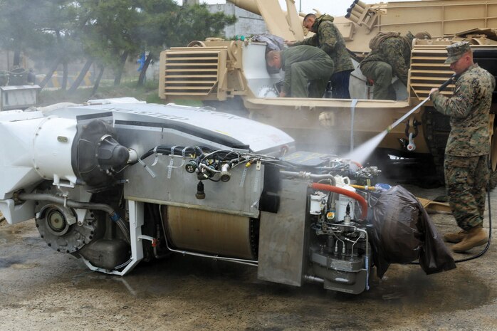 Marines with III Marine Expeditionary Force disassemble and clean the components of an M1A1 Abrams tank at the conclusion of the Combined Joint Logistics Over the Shore 2013 exercise in Pohang, Republic of Korea, May 1.