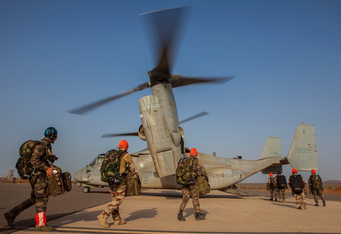 26th Marine Expeditionary Unit (MEU) Maritime Raid Force Marines and elements of the French Special Forces, board an MV-22B Osprey assigned to Marine Medium Tiltrotor Squadron (VMM) 266 (Reinforced), to conduct parachute operations in Djibouti, Africa, May 25, 2013. The 26th MEU is a Marine Air-Ground Task Force forward-deployed to the U.S. 5th Fleet area of responsibility aboard the Kearsarge Amphibious Ready Group serving as a sea-based, expeditionary crisis response force capable of conducting amphibious operations across the full  range of military operations. (U.S. Marine Corps photo by Sgt. Christopher Q. Stone, 26th MEU Combat Camera/Released)