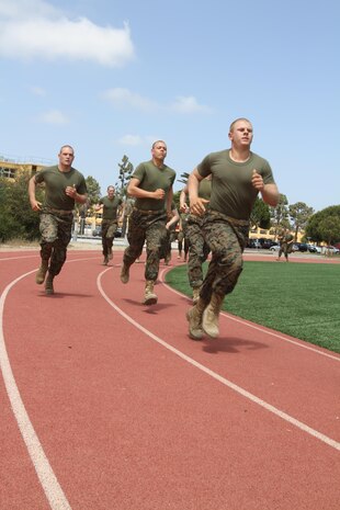 Recruits of Company G, 2nd Recruit Training Battalion, sprint the first portion of the Combat Fitness Test aboard Marine Corps Recruit Depot San Diego May 23. The CFT is an annual training event that simulates combat scenarios such as causality evacuation and ammunition resupply. (U.S. Marine Corps photo by Cpl. Bridget M. Keane/Released)