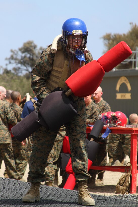 A recruit of Company L, 3rd Recruit Training Battalion, gets mentally prepared for his match during the Pugil Sticks II event aboard Marine Corps Recruit Depot San Diego May 23.  Staying focused on mission accomplishment and remembering the techniques recruits were taught helped many become victorious.  (U.S. Marine Corps photo by Lance Cpl. Benjamin E. Woodle/Released)
