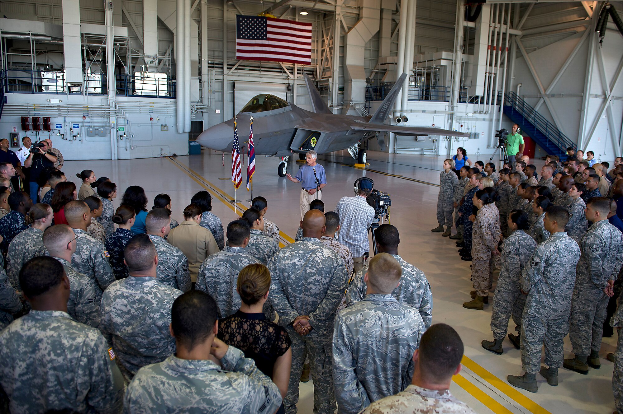 Defense Secretary Chuck Hagel addresses more than 200 service members from U.S. Pacific Command May 30, 2013, inside aircraft hangar 19 on Joint Base Pearl Harbor-Hickam, Hawaii. Hagel met with Pacific Command leaders before continuing to Singapore to speak at the Shangri-La Dialogue. As a senator, Hagel co-founded of the Shangri-La Dialogue, which began in 2002. This return visit to the dialogue will be his first as secretary of defense. The annual conference draws defense and security experts from across the Asia-Pacific region. Hagel’s travels will wrap up with a gathering of defense ministers at NATO headquarters in Brussels. (Department of Defense photo by U.S. Air Force Tech. Sgt. Michael R. Holzworth/Released)