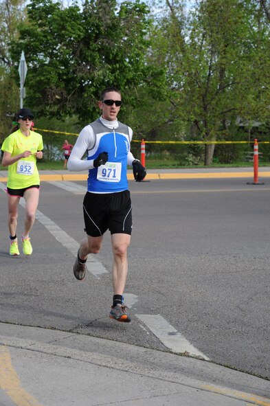 Capt. Zachary Kushner, 341st Operations Group ICBM combat crew commander, nears the end of the running portion of the duathlon on May 25. Kushner finished the race with a time of 56 minutes and 51 seconds, earning a third place finish in the males, ages 20 to 29 category. (U.S. Air Force photo/Airman 1st Class Katrina Heikkinen)