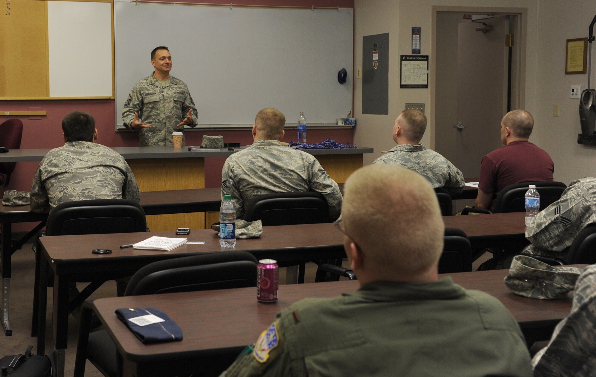 Master Sgt. Shane Schwendiman, in-service recruiter serving Malmstrom, McChord, Fairchild, Kadena, Yokota and Misawa Air Force Bases, discusses the benefits of joining the Air National Guard and the Air Force Reserves during a Palace Chase and Palace Front brief at the Education and Training Center on May 16. Schwendiman visits Malmstrom on a quarterly basis. (U.S. Air Force photo/Airman 1st Class Katrina Heikkinen)  