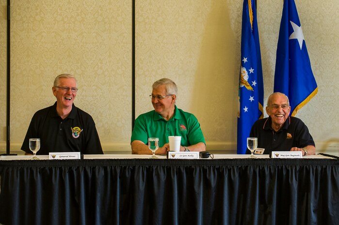 (From left) Ret. Gen. Walter Kross, Ret. Lt. Gen. Chris Kelly, and Ret. Maj. Gen. Jim Baginski share a laugh during  the Mobility Heritage Panel, May 23, 2013, at Joint Base Charleston – Air Base, S.C. Kross, chairman of the Airlift/ Tanker Association National Board of Officers, and board members, Kelly hosted a Mobility Heritage Panel where they discussed the history of mobility and our role in the U.S. Air Force. (U.S. Air Force photo/ Senior Airman George Goslin)