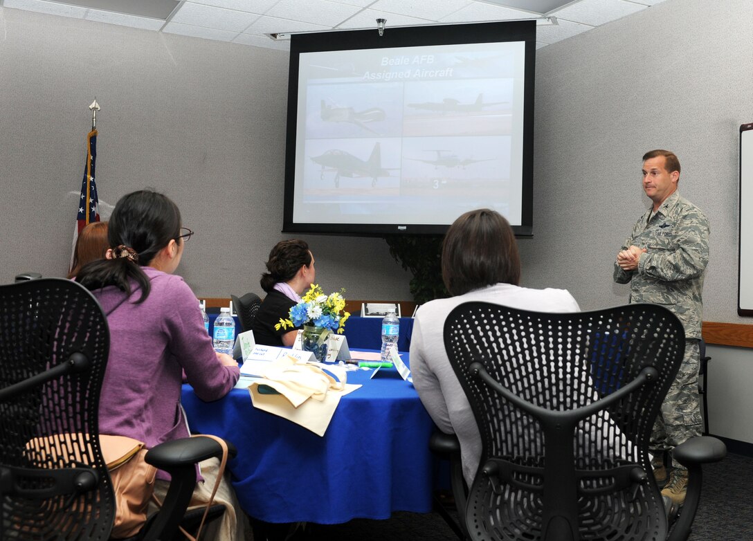 Col. Phil Stewart, 9th Reconnaissance Wing commander, speaks to Air Force spouses at the Airman and Family Readiness Center on Beale Air Force Base, Calif., May 30, 2013. Stewart informed the spouses about Beale's mission capabilities, and the importance of spouses and families to the Air Force community. (U.S. Air Force photo by Airman 1st Class Bobby Cummings/Released)