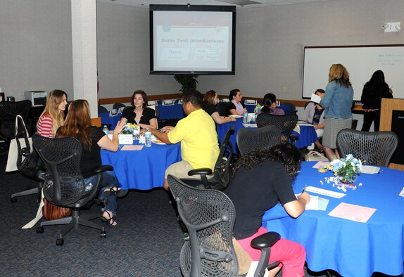 Military spouses attend Heart Link at the Airman and Family Readiness Center on Beale Air Force Base, Calif., May 30, 2013. Heart Link provides an interactive learning experience for spouses to better understand the services, support and military lifestyle. (U.S. Air Force photo by Airman 1st Class Bobby Cummings/Released)