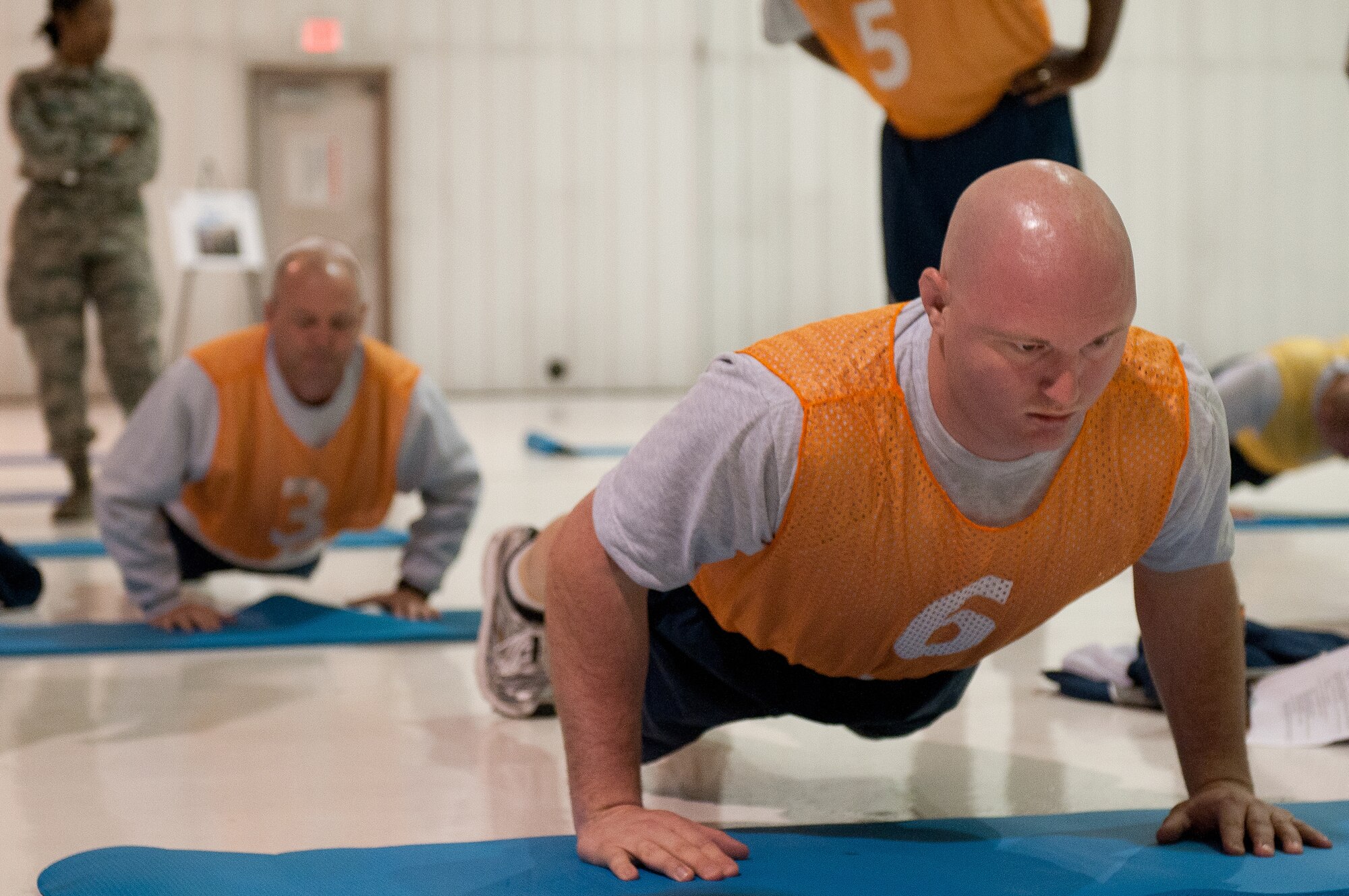 Staff Sgt. Brandon Curry, a firefighter from the 123rd Civil Engineer Squadron, participates in a mass physical fitness test at the Kentucky Air National Guard Base in Louisville, Ky., on April 27, 2013. The mass testing is designed to improve efficiency while giving Airmen the edge to succeed. (U.S. Air National Guard photo by Airman Joshua Horton)