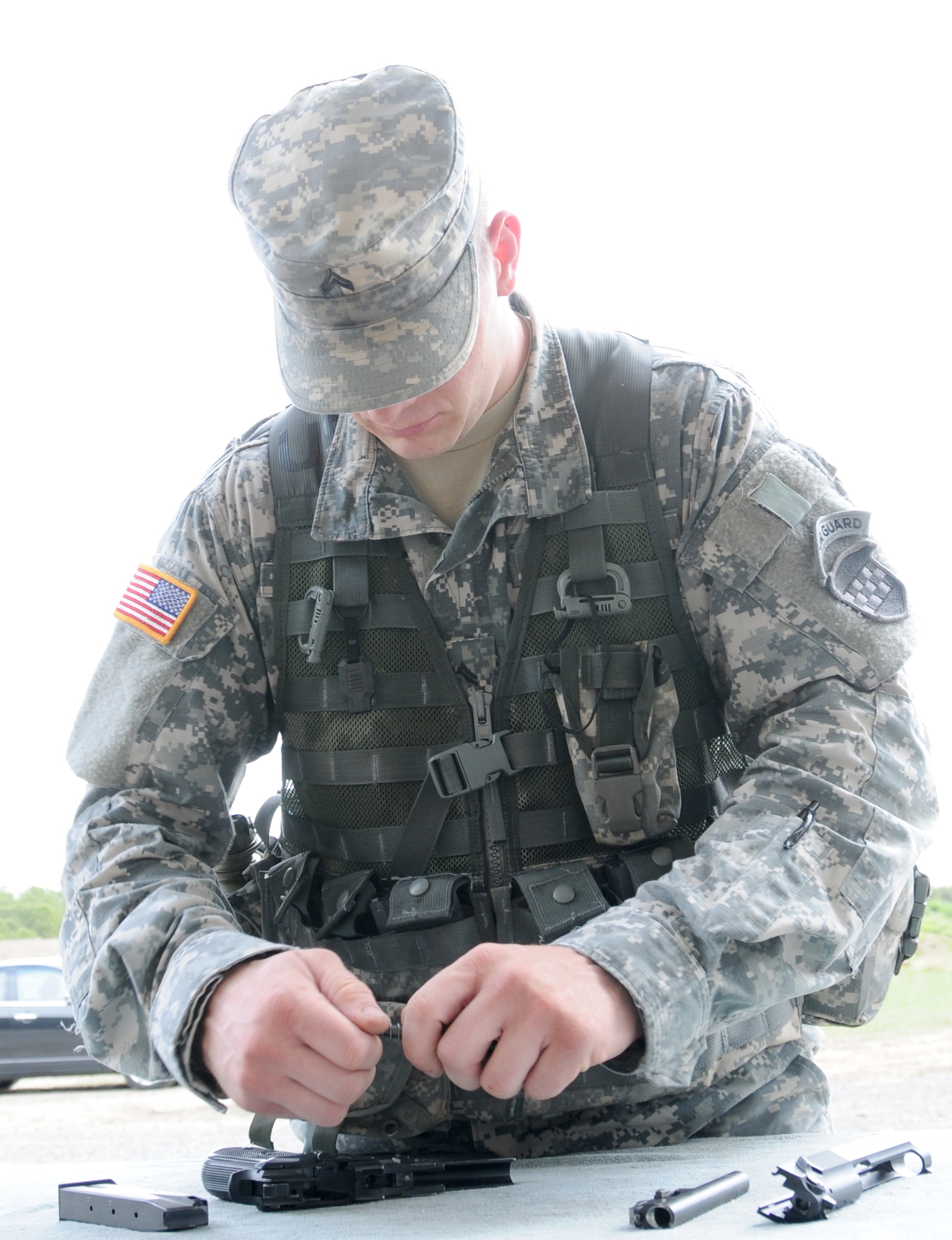 Cpl. Francis Kvarta 99th Regional Support Command acting supply sergeant, assembles an M9 pistol during the 99th RSC and Military Intelligence Readiness Command’s Best Warrior Competition April 17-19, 2013, at Joint Base McGuire-Dix-Lakehurst, N.J. Kvarta won the competition and now moves on to compete at the Army Reserve Command’s BWC scheduled June 23-28, 2013, at Fort McCoy, Wis. (U.S. Army photo by Sgt. Salvatore Ottaviano/Released)