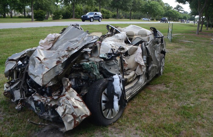 A wrecked vehicle reminds drivers of the consequences of drinking and driving June 28, 2013, at Joint Base Charleston –Air Base. (U.S. Air Force photo/Senior Airman Jared Trimarchi) 