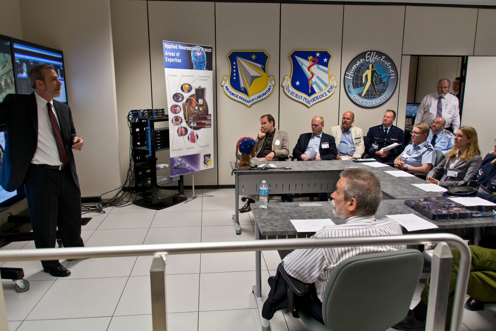 Human Performance Summit attendees listen attentively to a presentation at the Human Universal Measurement and Assessment Laboratory.  Photo credit: Mr. Rick Eldridge.