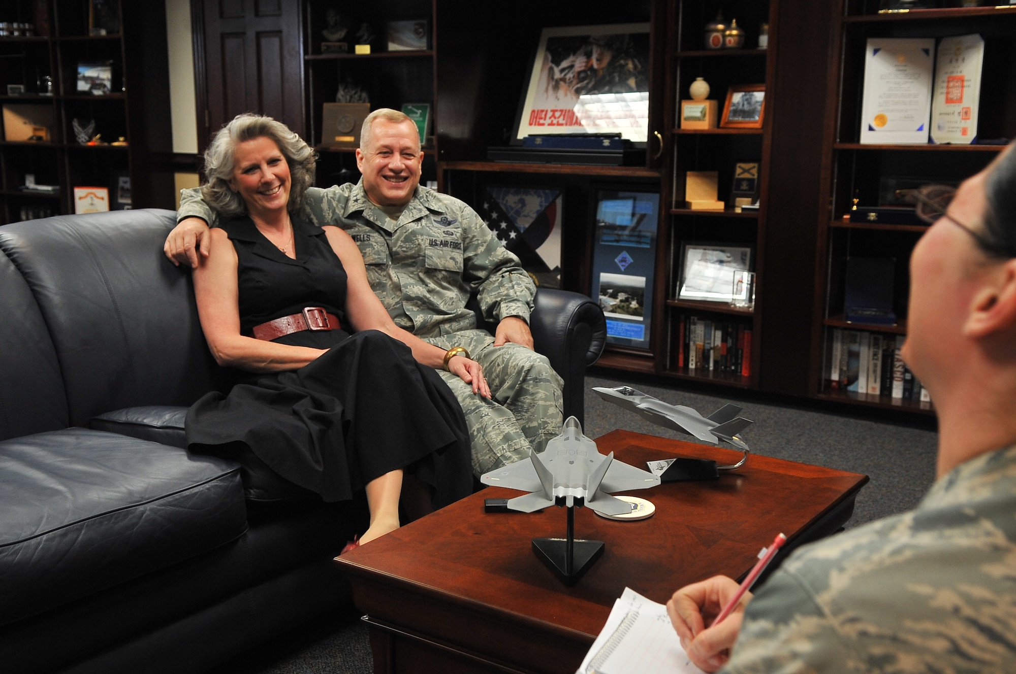 Air Force Maj. Gen. Lawrence Wells and his wife, Kathy Wells, sit down for a final interview with Ninth Air Force Public Affairs. General Wells will retire from his position as the Ninth Air Force commander, at Shaw Air Force Base, May 31, after 35 years of Air Force service. The couple agrees; the thing they will miss most is the Airmen. (U.S. Air Force photo by Airman 1st Class Ashley L. Gardner/ Released) 
