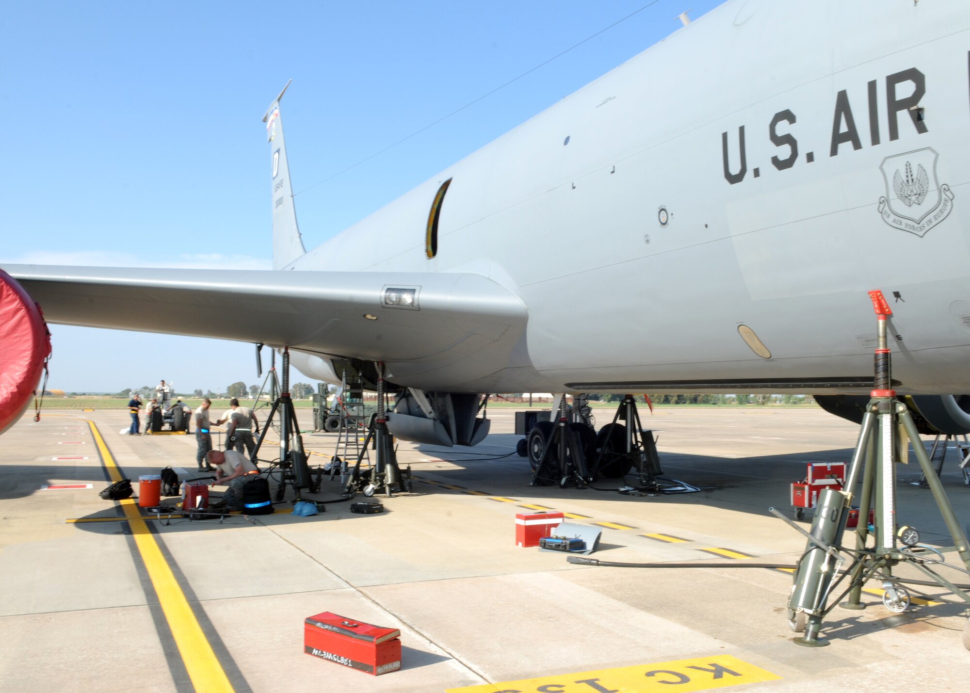 A KC-135R Stratotanker assigned to the 351st Expeditionary Air Refueling Squadron has its right-main-landing gear removed May 24, 2013, at Moron Air Base, Spain, allowing maintenance crews to work on the gear’s strut. The crews repacked the strut after discovering a break in the seal, keeping the aircraft safe for operation. (U.S. Air Force photo by 1st Lt. Christopher Mesnard/Released)