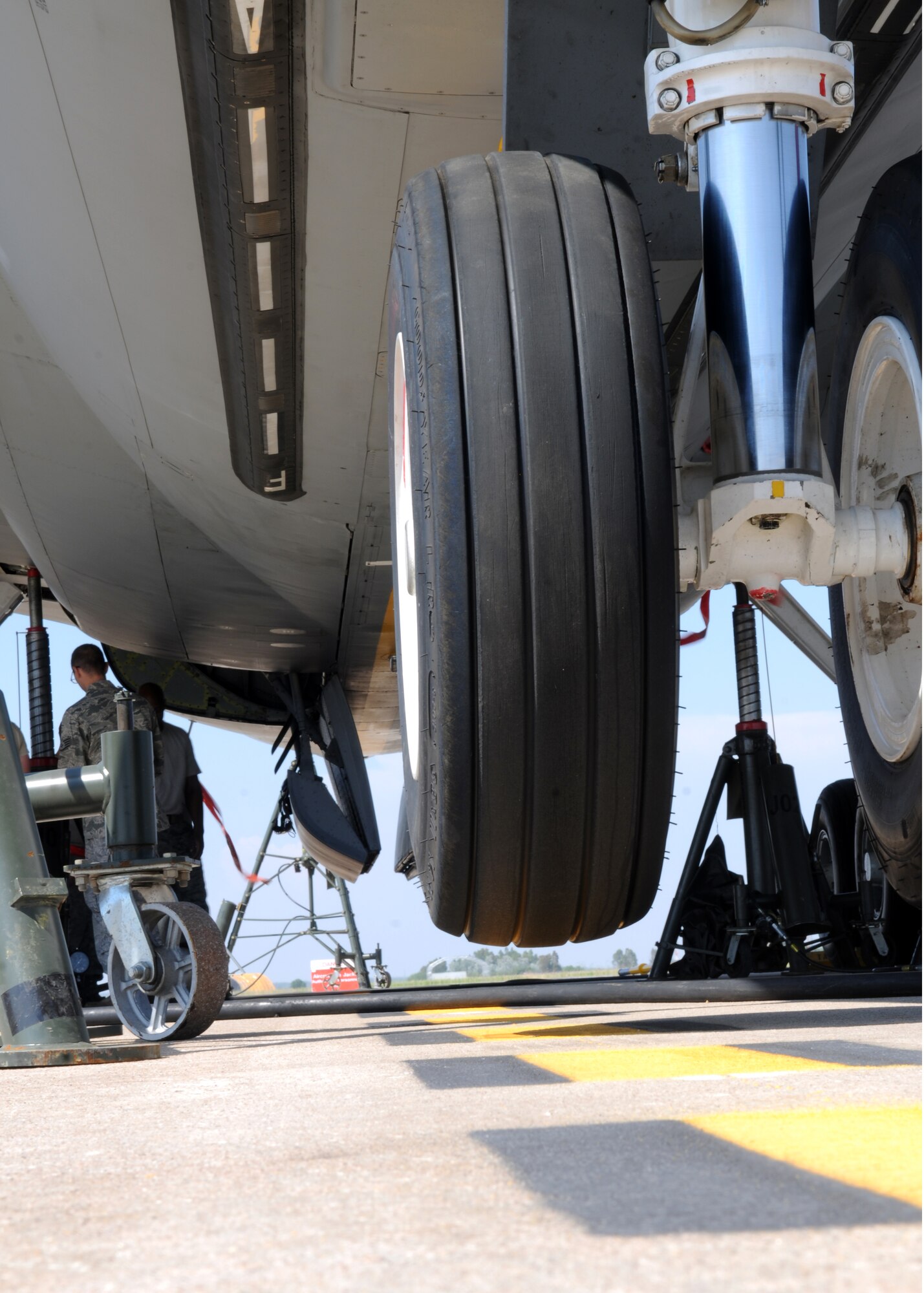 A KC-135R Stratotanker, deployed from the 100th Air Refueling Wing, is elevated off the ground May 24, 2013, at Moron Air Base, Spain, allowing Airmen to remove and repack the main-landing gear on the right side of the aircraft. The struts on the main-landing gear use pressure created by hydraulic fluid compressing air to cushion the aircraft when it lands. A flawed seal on the gear was discovered, and could have rendered the gear ineffective if it had been left unfixed. (U.S. Air Force photo by 1st Lt. Christopher Mesnard/Released)