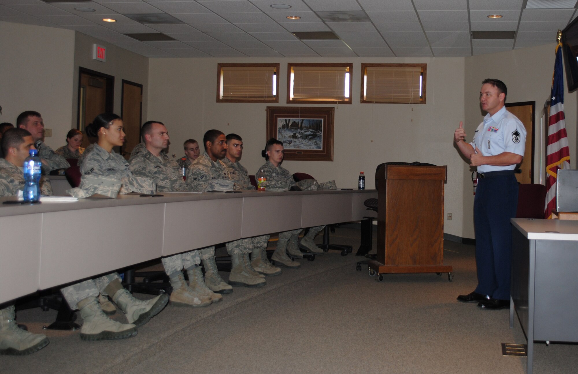 Master Sgt. Dan Annes, Air Force Recruiter Screening Team member, spoke to 30 Airmen attending a briefing about Air Force special duties, which took place May 17, 2013, at the base education center on Grand Forks Air Force Base, N.D. Annese addressed questions and concerns about becoming an Air Force recruiter. (U.S. Air Force photo/Staff Sgt. Luis H. Loza Gutierrez)