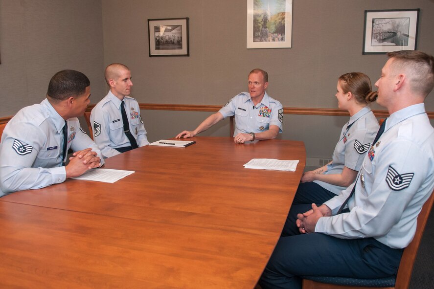 HANSCOM AIR FORCE BASE, Mass. -- Chief Master Sgt. of the Air Force James A.
Cody speaks with Airmen about special duty assignments during his visit here
May 29.  From left to right, Staff Sgt. Jeremy Guidry, Master Sgt. Timothy
Gatherum, Staff Sgt. Emma Byrne and Tech. Sgt. George Spreng met with the
Air Force's senior enlisted member to discuss changes to assigning the most
qualified Airmen to fulfill special duty assignments. During his visit, the
Chief also held two enlisted calls, met with base leadership, received a
warrior fitness demonstration and attended the Air Force Association's Chief
of Staff Scholarship Dinner, where he was the keynote speaker and presented
five scholarships to three high school seniors and two Airmen. (U.S. Air
Force Photo by Rick Berry)
