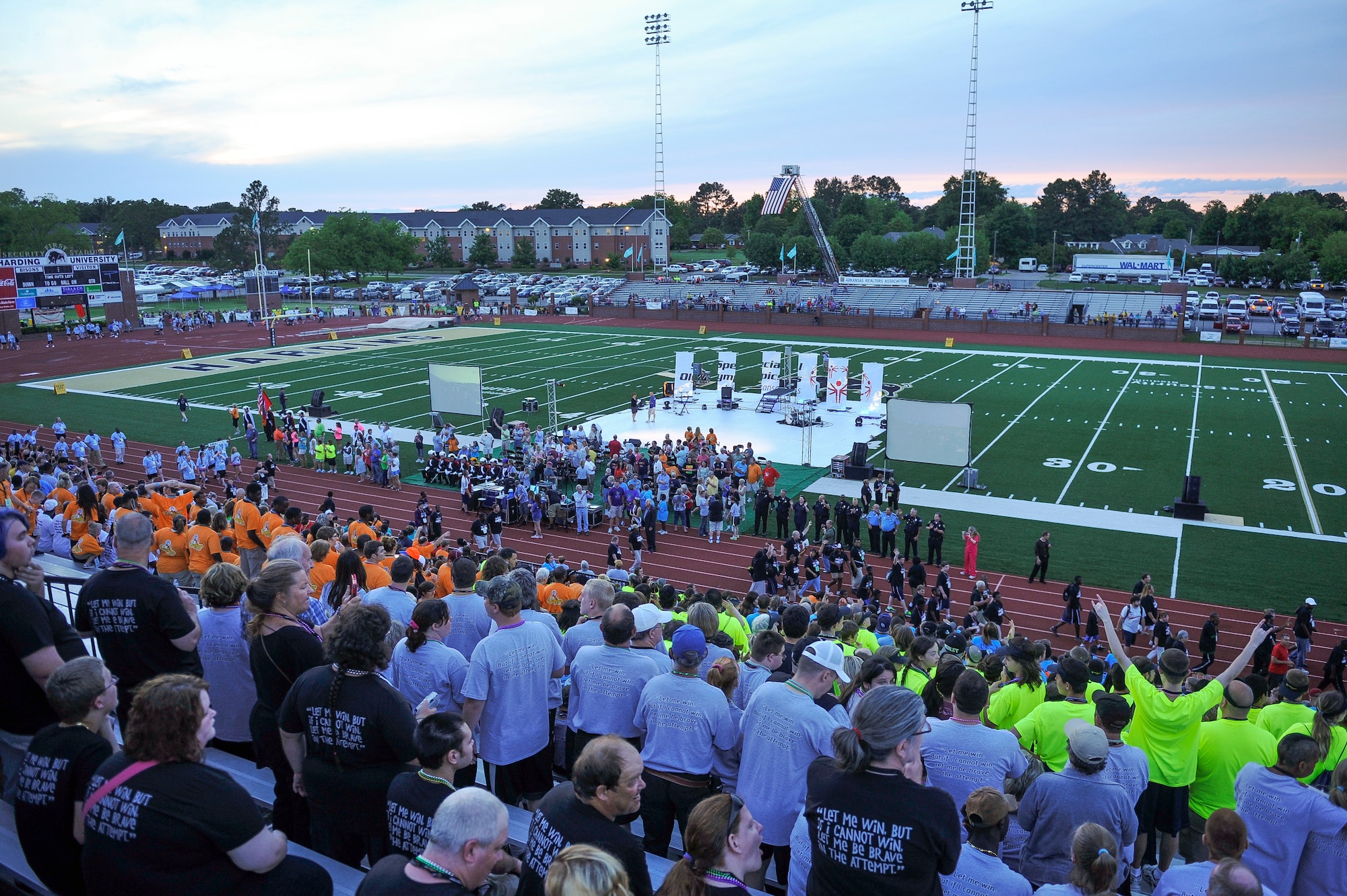 Competitors at the 2013 Arkansas Summer Special Olympics cheer during the games’ opening ceremonies May 23, 2013, at Harding University Football Stadium in Searcy, Ark. The three day event drew athletes from around the state to compete in events ranging from the 50 meter walk to flag football. (U.S. Air Force photo by Staff Sgt. Russ Scalf)