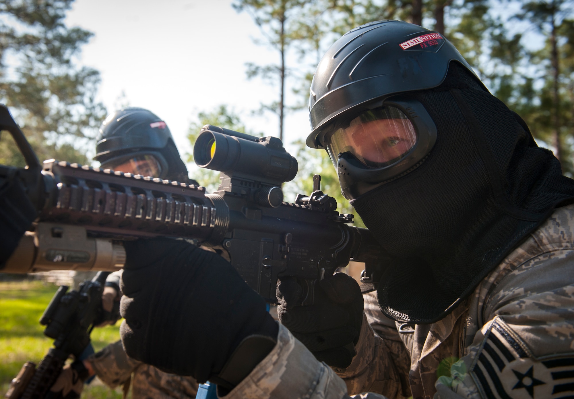 Alan Fox, a former mortar crewman during Operation Safeside, takes aim during a scenario for the 2013 Safeside Reunion at Moody Air Force Base, Ga., May 18, 2013. Safeside veterans were paired up with active-duty Airmen for events like the shoot, move and communicate scenario. (U.S. Air Force photo by Senior Airman Jarrod Grammel/Released)
