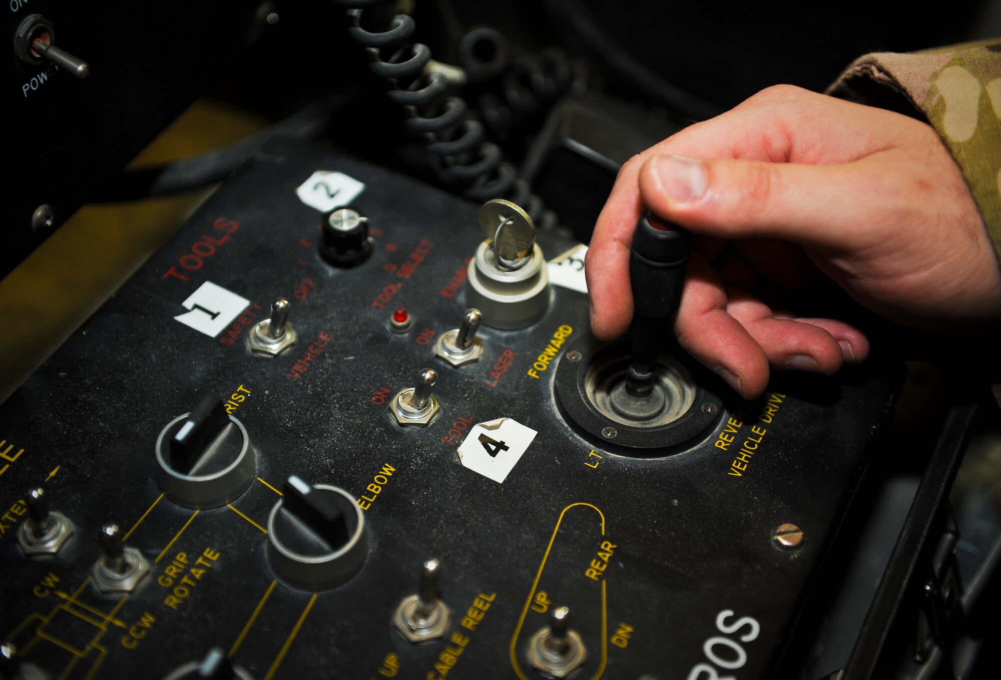 Staff Sgt. Joel Calahan practices with the control console of an explosive ordnance disposal robot, May 29, 2013, at the 379th Air Expeditionary Wing in Southwest Asia. Calahan is a 379th Expeditionary Civil Engineer Squadron EOD craftsman deployed from Nellis Air Force Base, Nev. (U.S. Air Force photo/Senior Airman Benjamin Stratton)