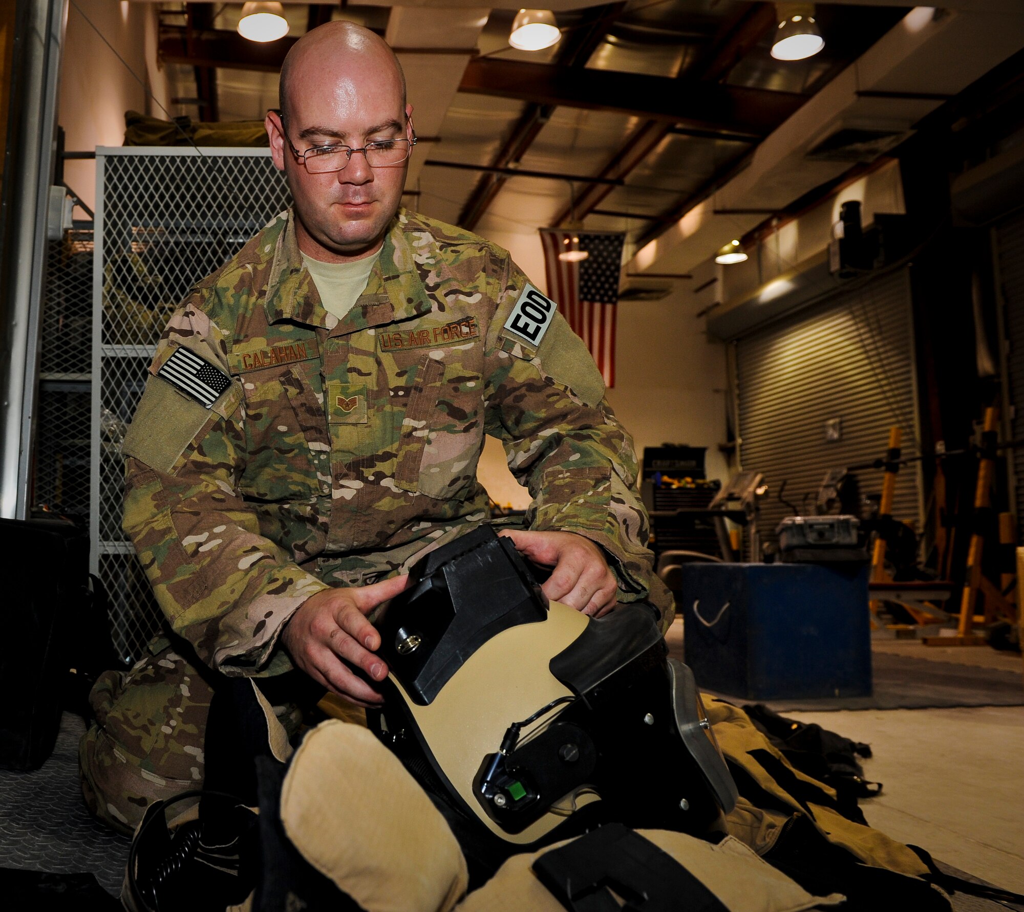 Staff Sgt. Joel Calahan inspects the battery pack of an explosive ordnance disposal bomb suit, May 29, 2013, at the 379th Air Expeditionary Wing in Southwest Asia. Calahan is a 379th Expeditionary Civil Engineer Squadron EOD craftsman deployed from Nellis Air Force Base, Nev. (U.S. Air Force photo/Senior Airman Benjamin Stratton)