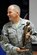 Command Chief Master Sgt. Dennis Daubert receives an aerial port sculpture from the 386th Air Expeditionary Wing Chief group May 28, 2013, during Chief Daubert's retirement ceremony at the 386th Air Expeditionary Wing, Southwest Asia. (U.S. Air Force photo/Staff Sgt. Austin Knox)
