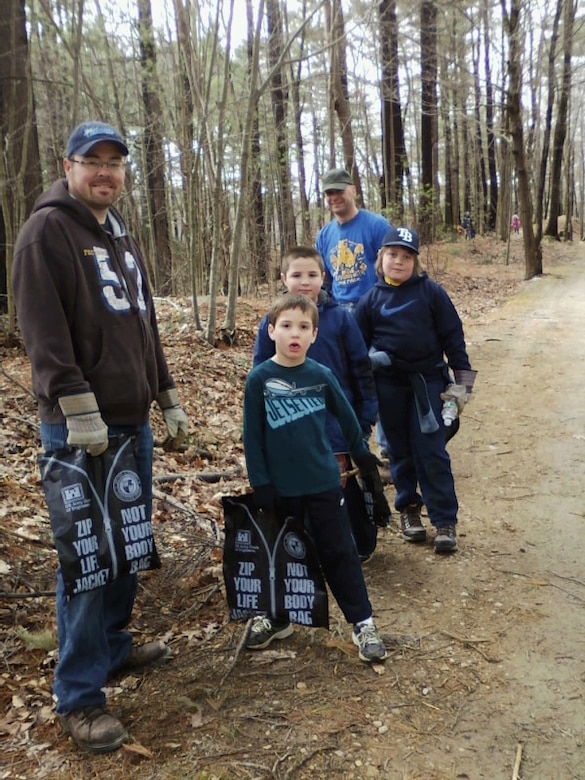 Cub Scouts and Leaders of of Pack 161 collect trash at Westville Lake, Southbridge, Mass., in celebration of Earth Day, April 13, 2013.