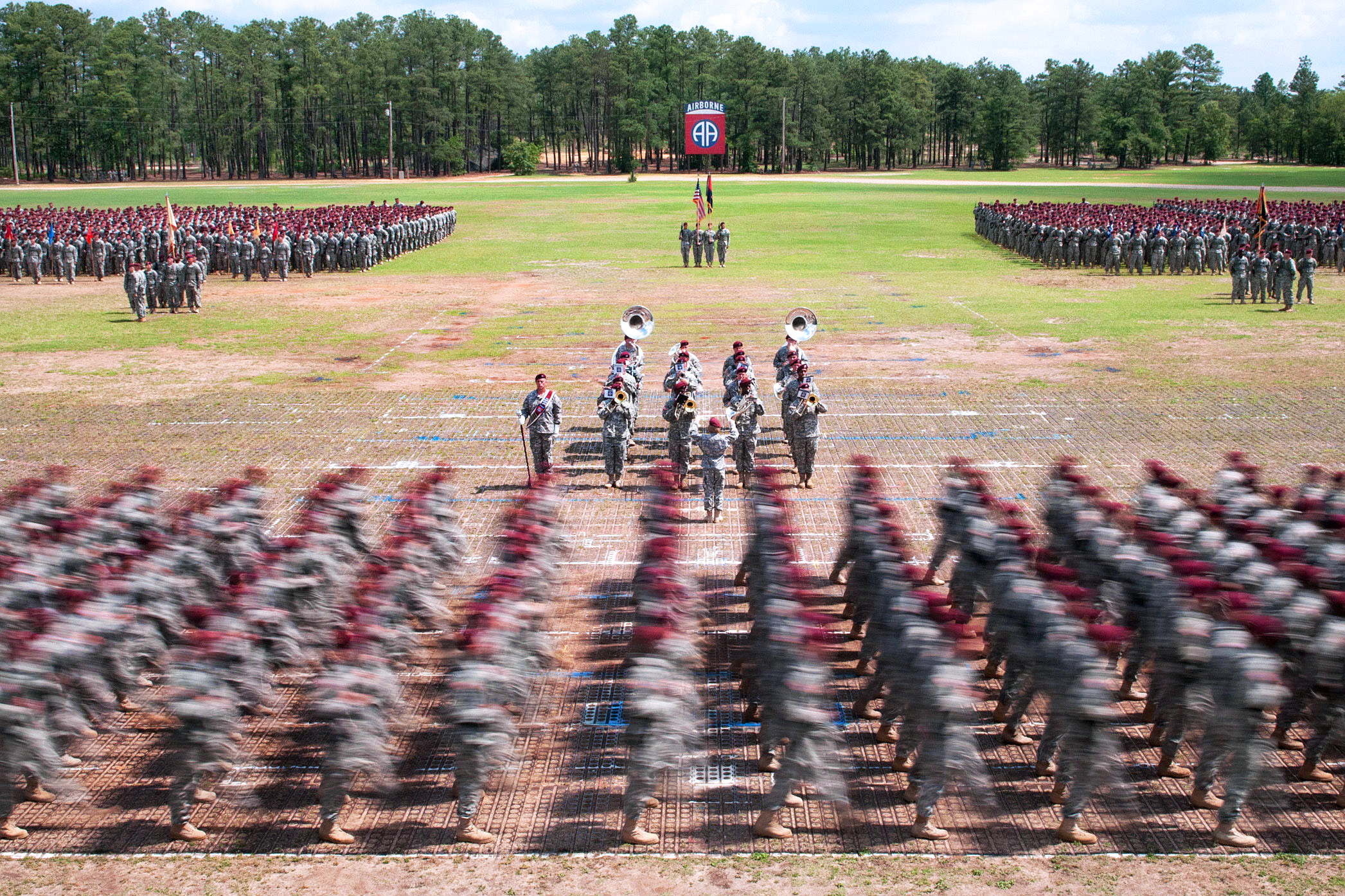 The AllAmerican Marching Band performs while more than 14,500 paratroopers assigned to the 82nd