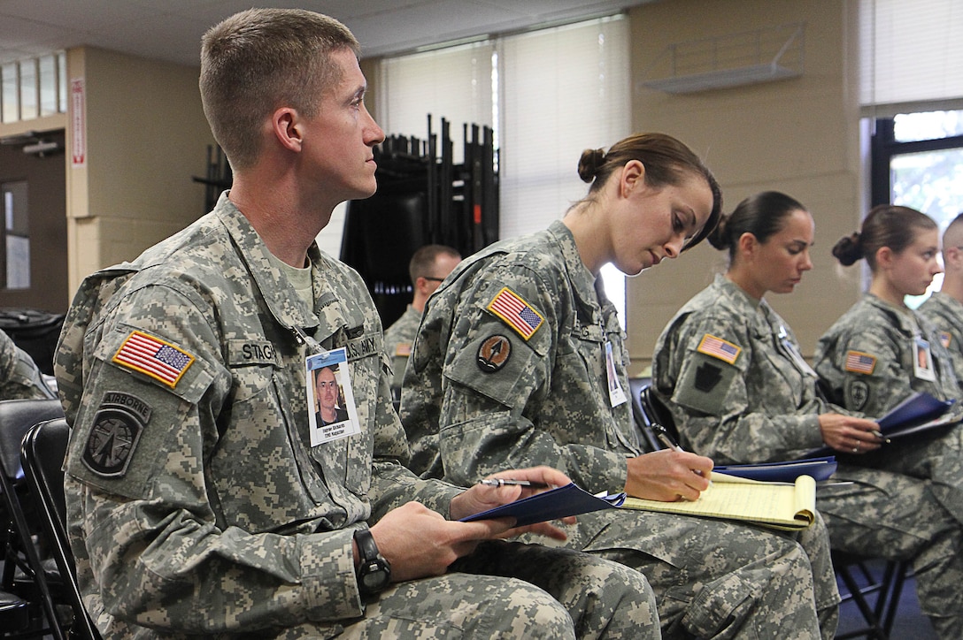 Soldiers from the 133rd Mobile Public Affairs Detachment participate in a mock press conference during their mobilization validation process May 14, 2013, at Joint Base McGuire-Dix-Lakehurst, N.J.. The unit will deploy to Guantanamo Bay, Cuba, for what could be a historic chapter in the global war on terror. (U.S. Army photo by Staff Sgt. Lasima Packett/Released)