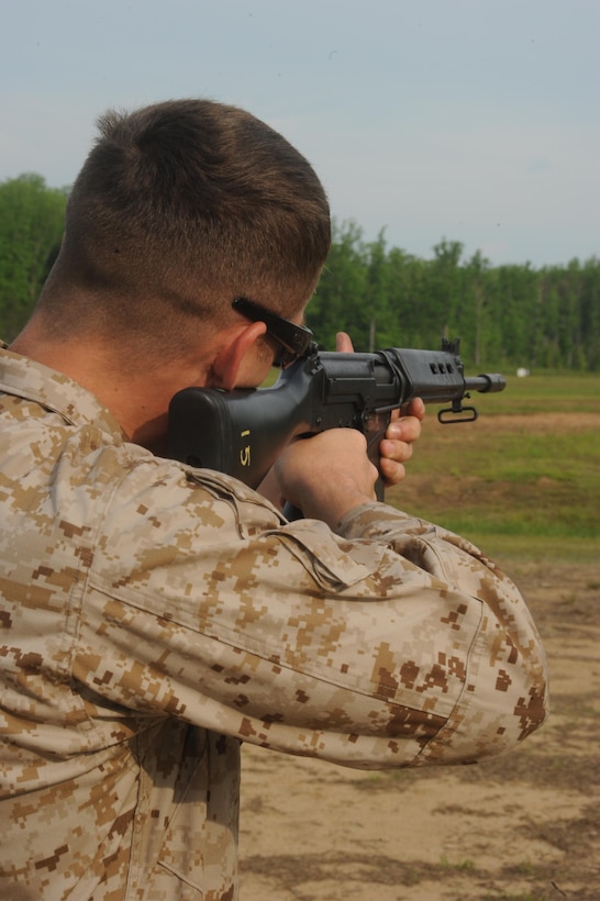 Sgt. Clint Bilbrey aims downrange with a FN FAL rifle aboard Marine Corps Base Quantico on May 16, 2013. Bilbrey was shooting the rifle during a Foreign Weapons Course he is attending.