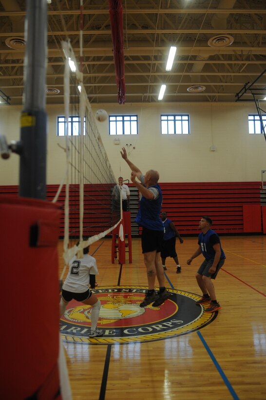 The Basic School and the Marine Corps Systems Command compete during an intramural volleyball game at Barber Physical Activities Center aboard Marine Corps Base Quantico on May 28, 2013. MCSC won the game after a close second set.