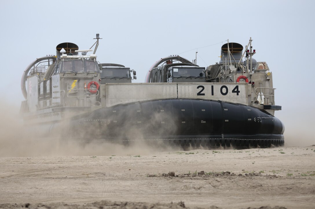 A Japanese landing craft air cushion (LCAC) lands on Red Beach as part of the initial offload for Exercise Dawn Blitz here, Camp Pendleton, CA, May 31, 2013. Dawn Blitz 2013 is an amphibious exercise testing U.S. and coalition forces in skills expected of a Navy and Marine Corps amphibious task force. Forces will conduct amphibious assaults, live-fire opportunities, mine operations, Maritime Prepositioning of Force (MPF) training and sea-basing operations. (Photo by U.S. Marine Corps Gunnery Sgt. Chance W. Haworth, 11TH MEU, Combat Camera/Released)