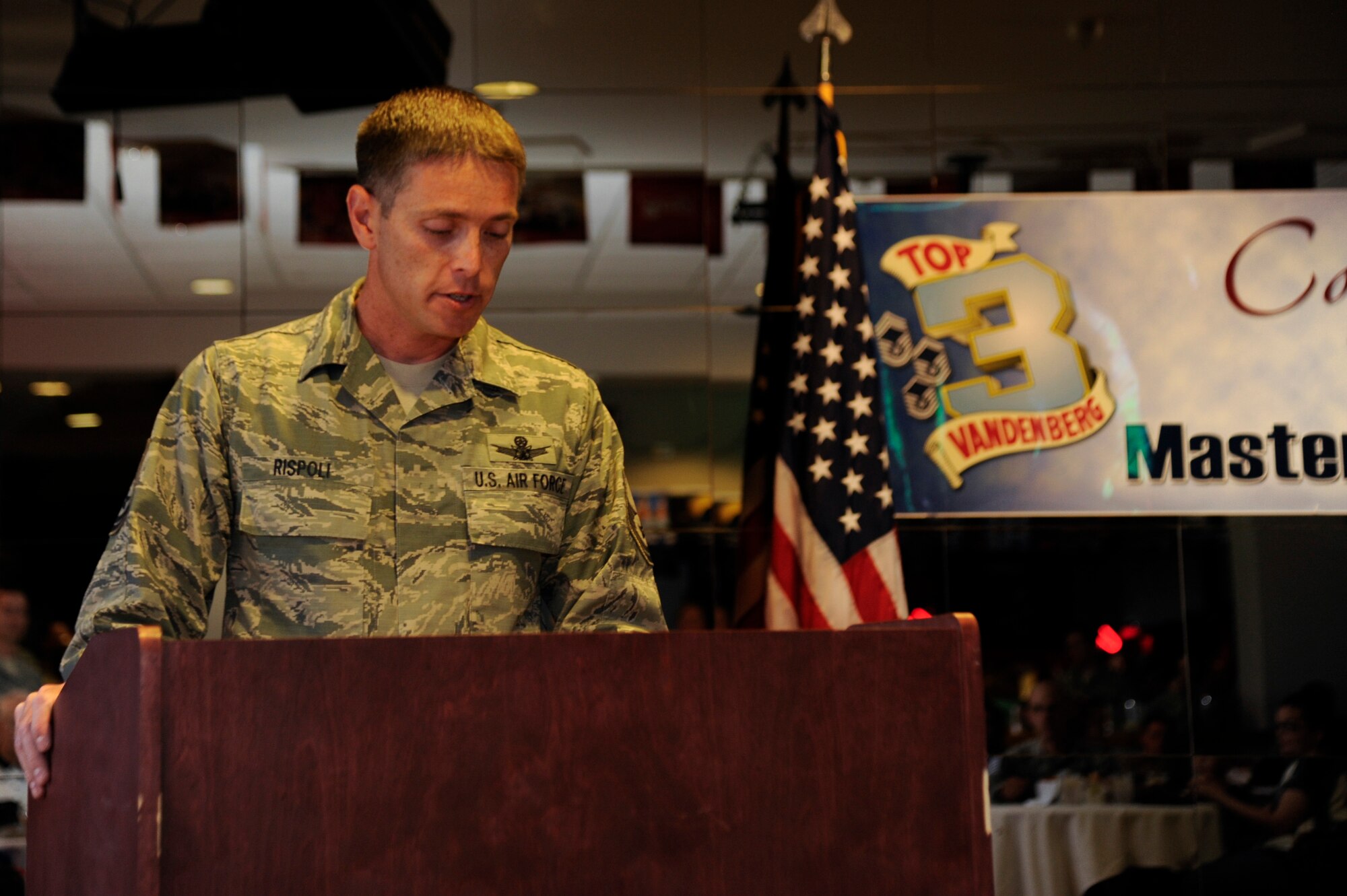 VANDENBERG AIR FORCE BASE, Calif. – Master Sgt. Craig Rispoli, a 533rd Training Squadron instructor, speaks as master of ceremonies for Vandenberg’s Master Sergeant Promotion Ceremony at the Pacific Coast Club’s enlisted lounge here Friday, May 31, 2013. The master sergeants promotion ceremony recognizes the significant promotion to senior noncommissioned officer in the United States Air Force. (U.S. Air Force photo/Senior Airman Lael Huss)