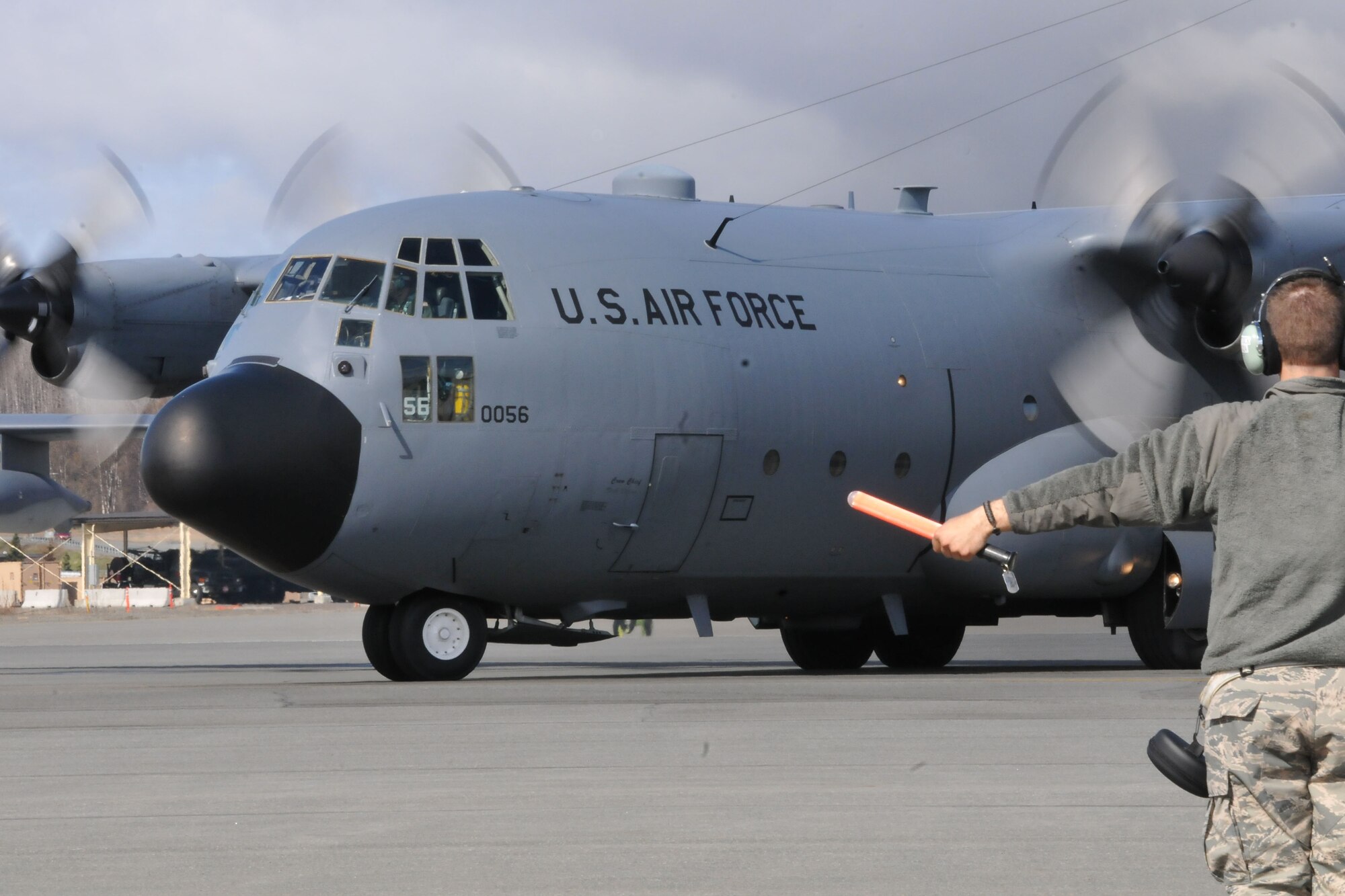 JOINT BASE ELMENDORF-RICHARDSON, Alaska -- Cargo plane "Five Six" taxis to the runway here May 23, 2013 for its last flight bearing the 176 Wing name. The Alaska Air National Guard's 176 Wing transfered three C-130 cargo planes to the Ohio Air National Guard's 179th Airlift Wing. National Guard photo by Staff Sgt. N. Alicia Goldberger. 