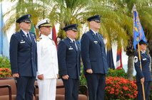 Col. Johnny Roscoe, Commander, 15th Wing, Capt Jeffrey James, Commander, Joint Base Pearl Harbor-Hickam, Col. Dann Carlson, departing Commander, 647th Air Base Group, and Col. David Kirkendall, arriving Commander, 647th ABG stand ready to begin the 647th ABG change of command ceremony on 31 May 2013 at the Missing Man Formation on Hickam Field.  (Photo by David D. Underwood, Jr.)

