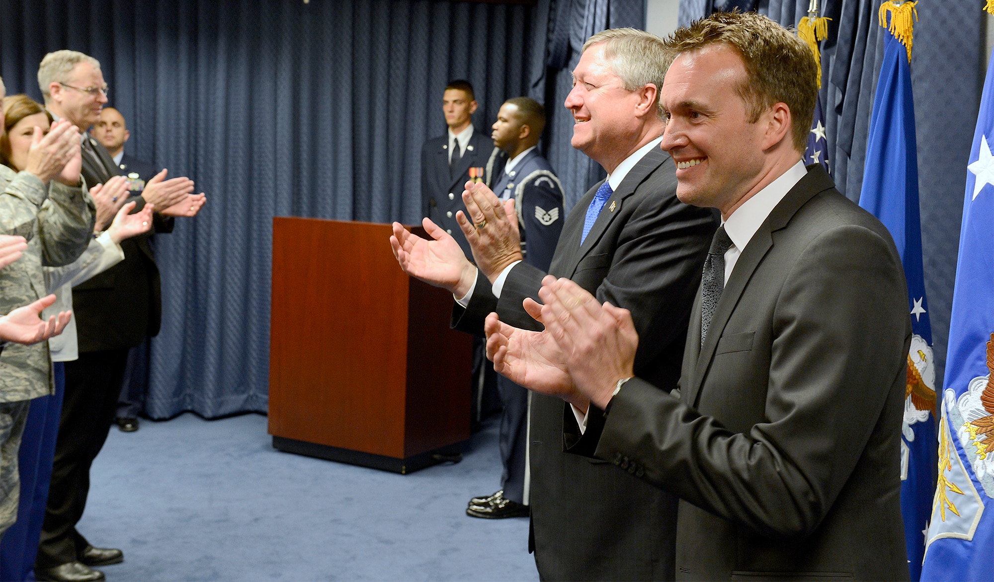 Under Secretary of the Air Force Eric Fanning sings the Air Force song with Secretary of the Air Force Michael Donley following a formal swearing-in ceremony May 31, 2013 at the Pentagon.  In his duties, Fanning will be responsible for the efficient and effective management of Air Force resources and serve as the senior Air Force energy official. Additionally, he will serve as the focal point for space operations, policy and acquisition issues on the Air Force staff. (U.S. Air Force photo/Scott M. Ash)