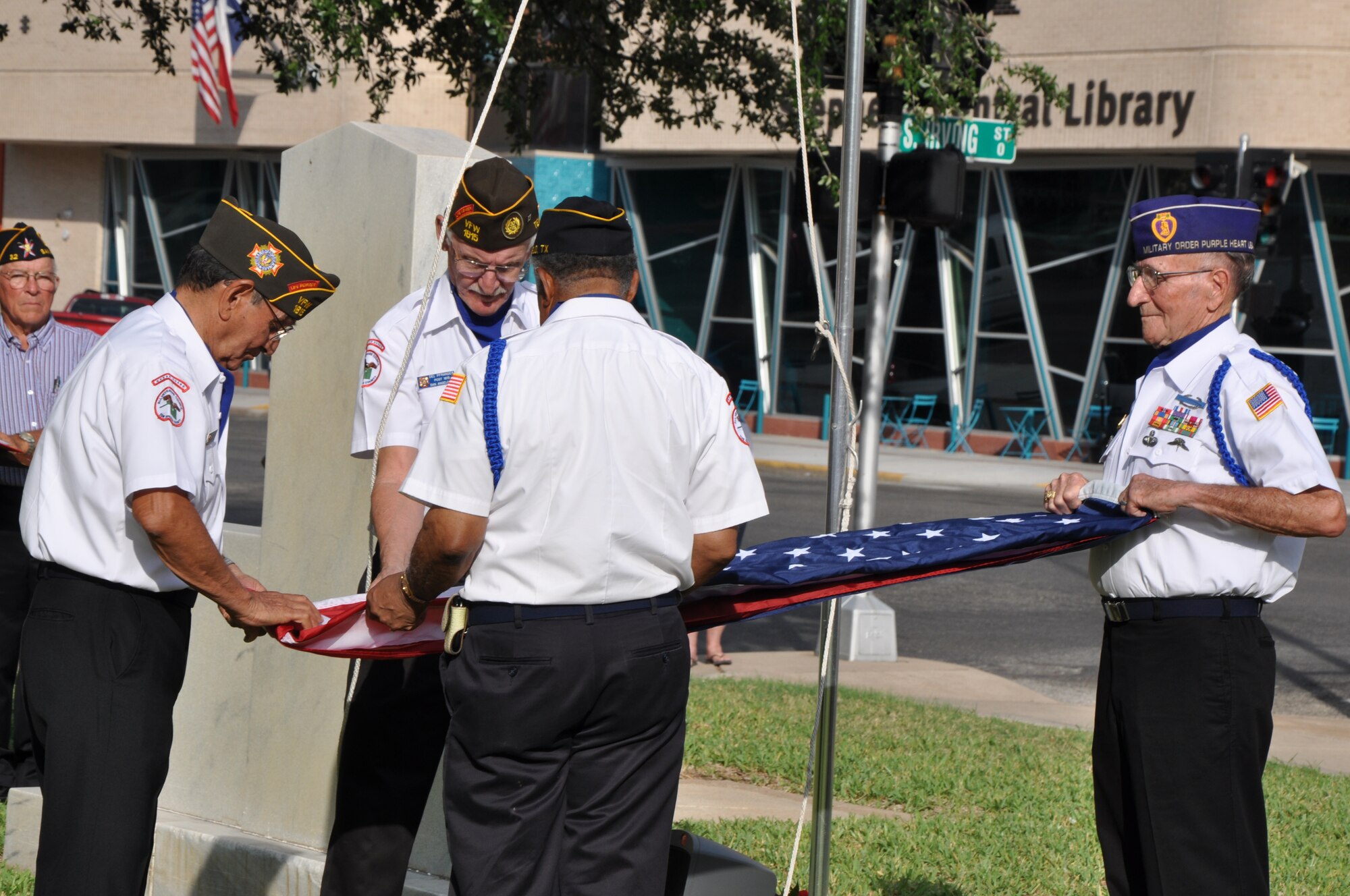 SAN ANGELO, Texas – Members of the All Veterans Council fold an American flag during the Memorial Day Commemoration ceremony at the Tom Green County Courthouse, May 27. The All Veterans Council then presented the flag to one of the other veterans in attendance. (U.S. Air Force photo/ Airman 1st Class Joshua Edwards)