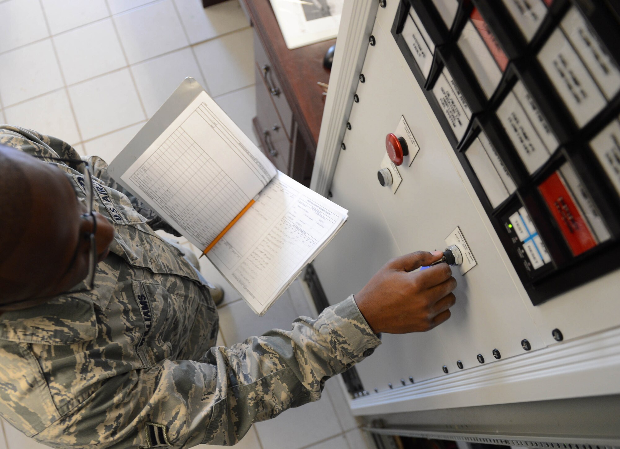 Airman 1st Class James Williams, 2 CES Water and Fuel Systems Maintenance Apprentice, performs operational checks of Programmable Logic Controllers for one of Barksdale's hydrant refueling systems, May 22, 2012. All fuel systems are closely monitored to provide clean, dry fuel for aircraft and government vehicles. (U.S. Air Force photo by Senior Airman Micaiah Anthony)

