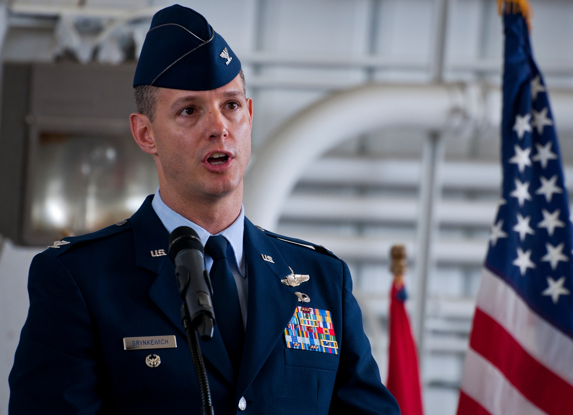 Col. Alexus Grynkewich speaks to the 53rd Wing for the first time as its commander during a change of command ceremony May 30 at Eglin Air Force Base, Fla.  Grynkewich took command of the wing from Col. David Hicks, who leaves to become the deputy director of operations for North American Aerospace Defense Command at Peterson, AFB, Colo.  (U.S. Air Force photo/Samuel King Jr.)