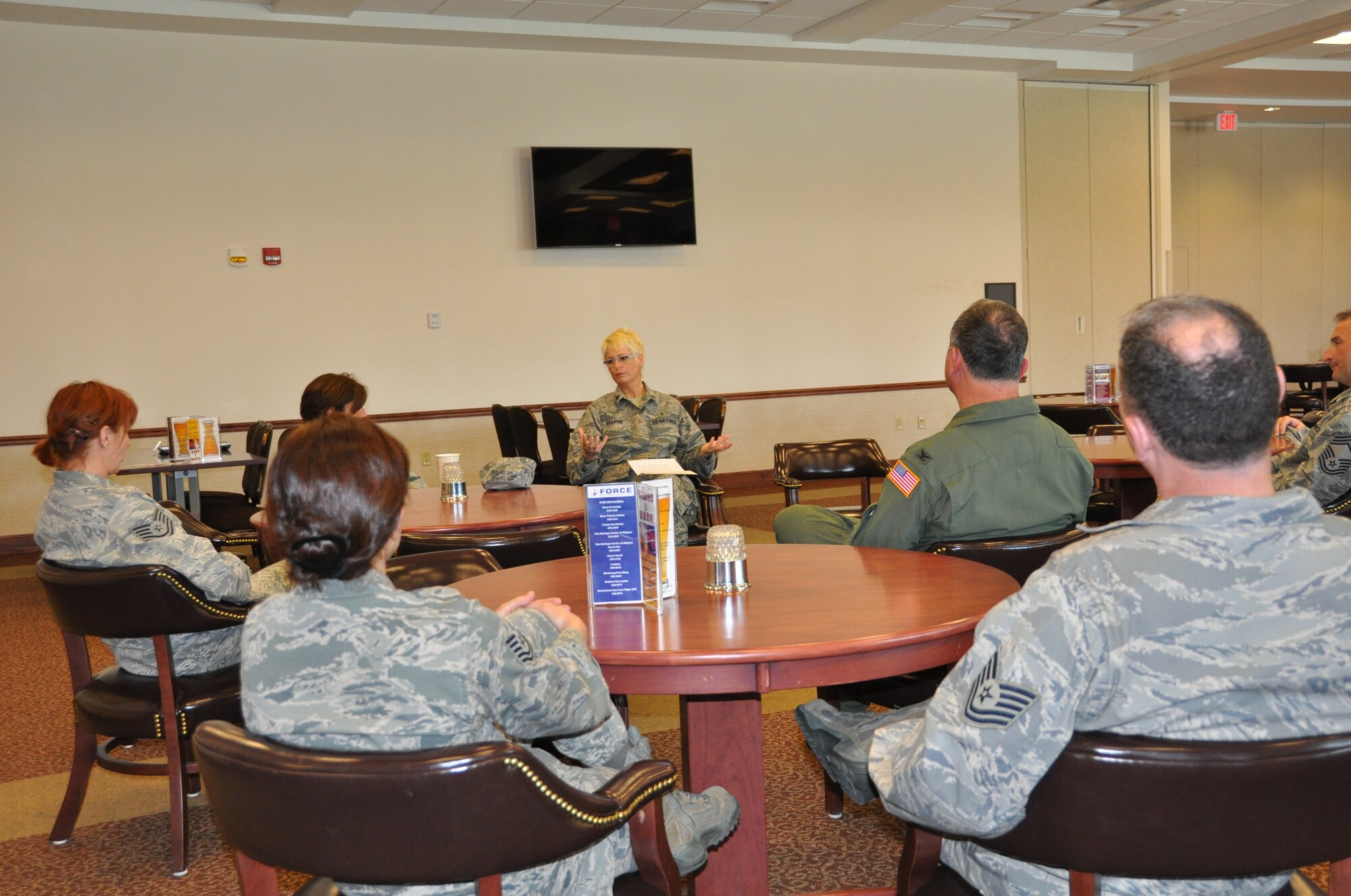 Chaplain (Lt. Col. ) Karis Graham meets with Airmen during the 914th Unit Training Assembly on base.  After leaving the U.S. Navy and becoming an Airman, Graham was a pastor stateside, went overseas and rose to the position of wing chaplain of the 501st Combat Support Wing in United Kingdom until 2006, when she left Active Duty to work on her Doctorate. During this time, she went into the Air Force Reserves and served as part of the Honor Guard at Arlington National Cemetery for the past several years until she transferred to the Niagara Falls ARS. (U.S. Air Force photo by Master Sgt. Kevin Nichols)