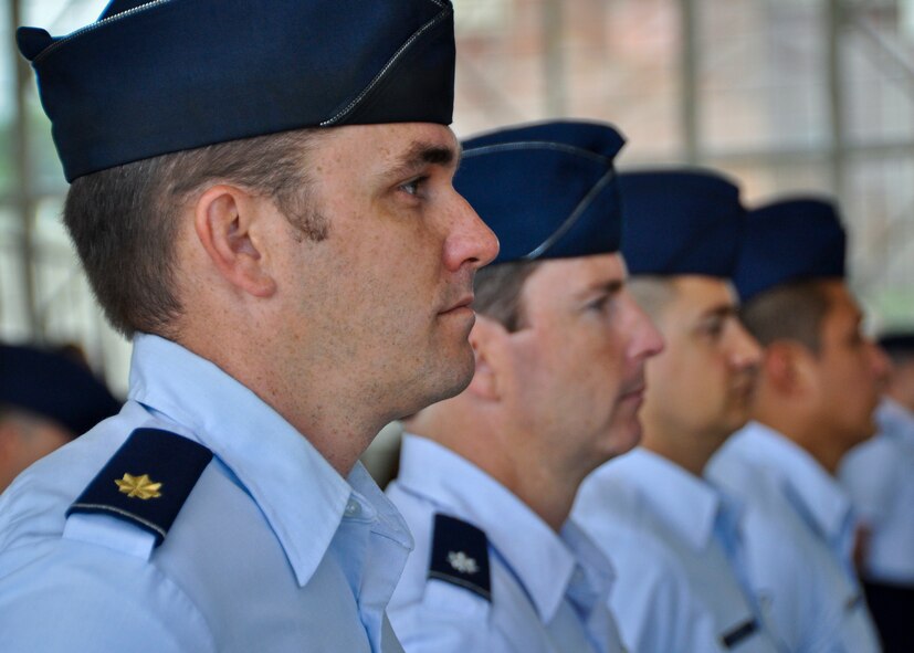 Airmen with the 53rd Wing stand at parade rest before the wing’s change of command ceremony begins May 30 at Eglin Air Force Base, Fla.  Col. Alexus Grynkewich took command of the wing from Col. David Hicks, who leaves to become the deputy director of operations for North American Aerospace Defense Command at Peterson, AFB, Colo.  (U.S. Air Force photo/Sara Vidoni)