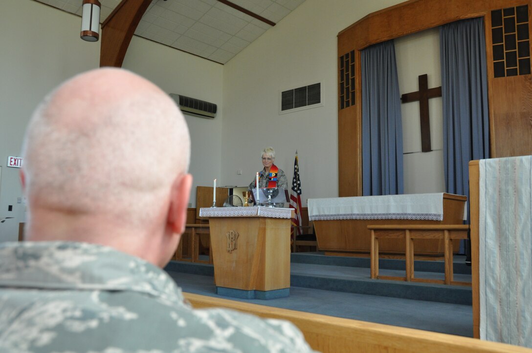Chaplain (Lt. Col.) Karis Graham performs a Lutheran liturgical service during the 914th Unit Training Assembly on base.  After leaving the U.S. Navy and becoming an Airman, Graham was a pastor stateside, went overseas and rose to the position of wing chaplain of the 501st Combat Support Wing in United Kingdom until 2006, when she left Active Duty to work on her Doctorate. During this time, she went into the Air Force Reserves and served as part of the Honor Guard at Arlington National Cemetery for the 