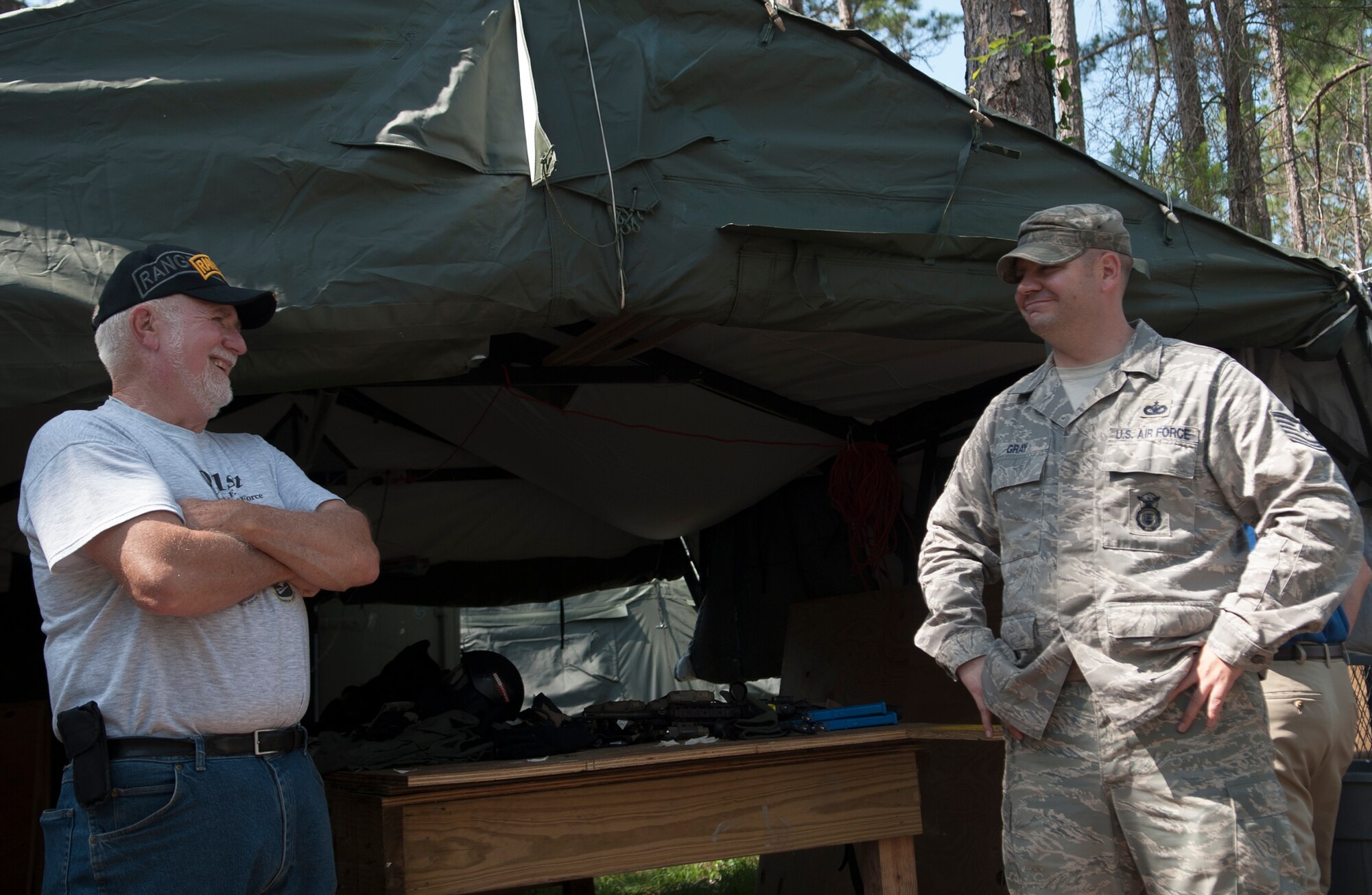 U.S. Air Force Tech Sgt. Sean Gray, 822nd Base Defense Squadron NCO in charge, converses with a former Safesider at Moody Air Force Base Ga., May 18, 2013.  The Safesider shared stories of his time in Vietnam with Gray. (U.S. Air Force photo by Airman 1st Class Sandra Marrero/Released)
