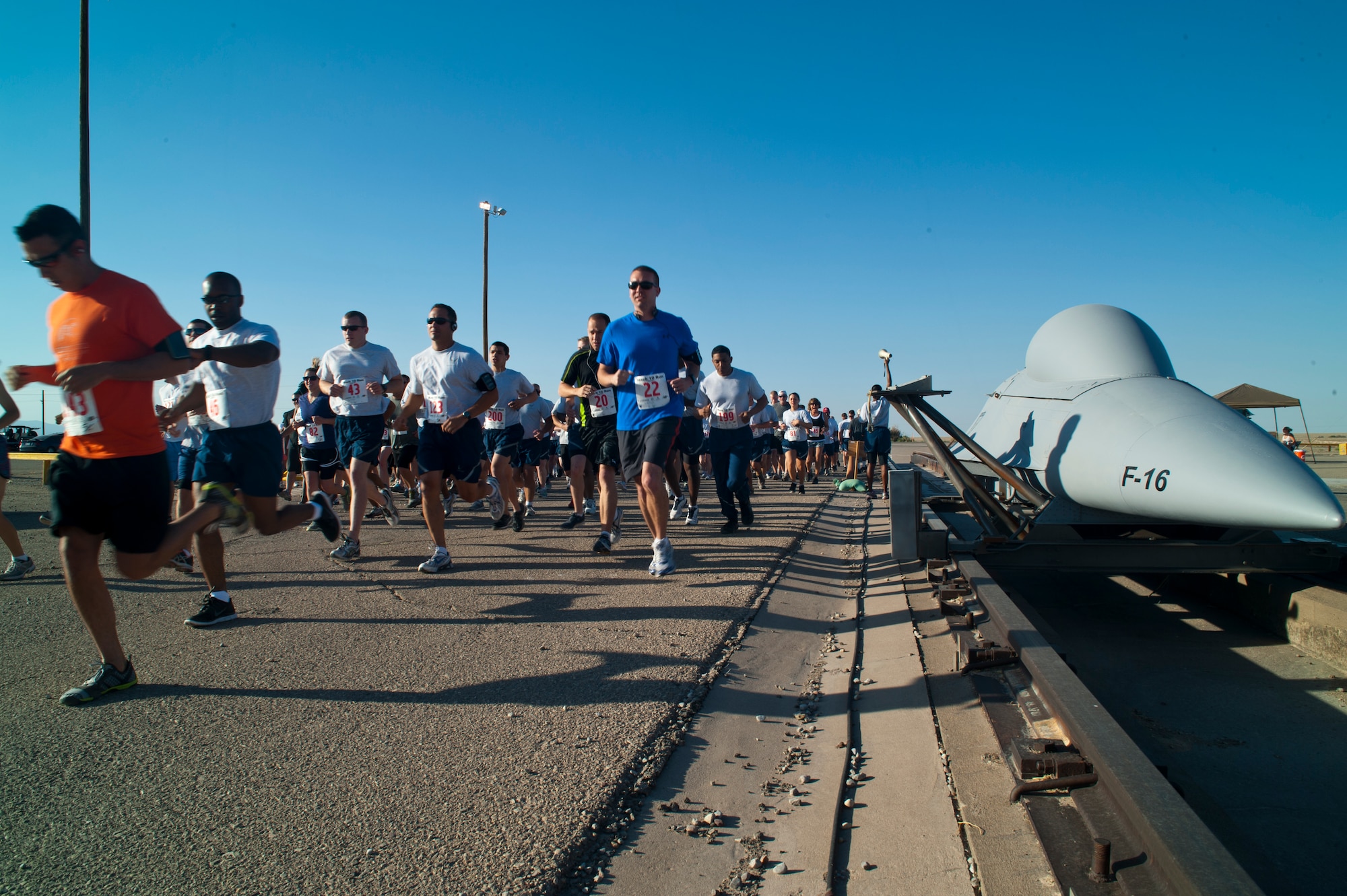 Members of Team Holloman participate in the Mach 10 Run at Holloman Air Force Base, N.M., May 31. The run took place at the Holloman AFB High Speed Test Track where more than 230 participated in the 5K, 10K, or 10 mile event. (U.S. Air Force photo by Airman 1st Class Leah Murray/Released)
