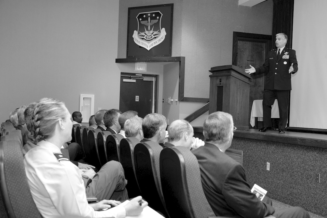 Major Gen. Walter Givhan, commander of the Curtis E. LeMay Center for Doctrine Development and Education, discusses his experiences with the State Department during the River Region Forum May 23 at the LeMay Center. (U.S. Air Force photo by Melanie Rogers Cox)