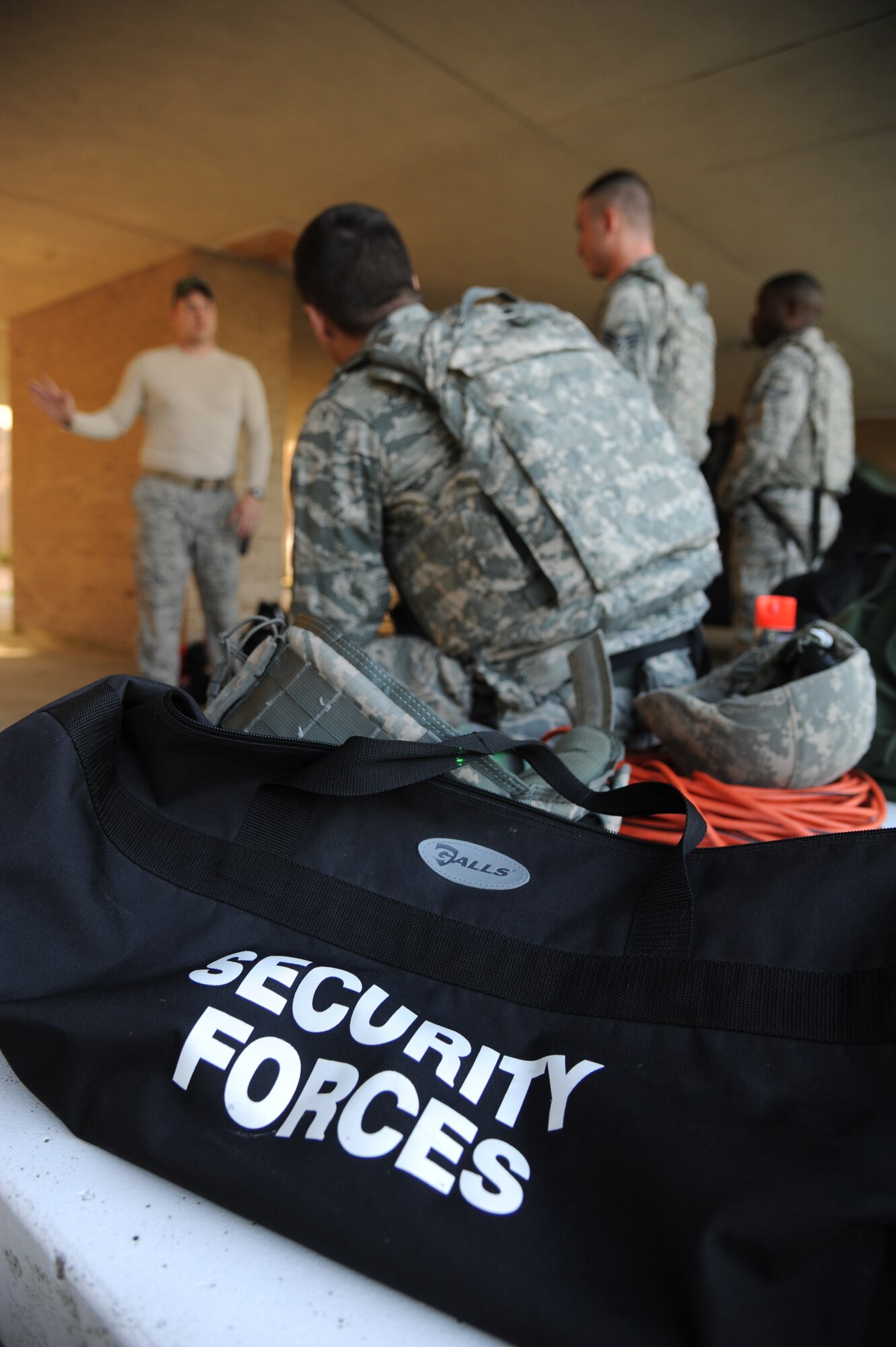 Tech. Sgt. Brandon Geeslin, 81st Security Forces Squadron, briefs the active shooter training scenario to other 81st SFS members May 28, 2013, at The Locker House, Keesler Air Force Base, Miss.  The two-day annual training helps to prepare them to react during real-world situations.  (U.S. Air Force photo by Kemberly Groue)