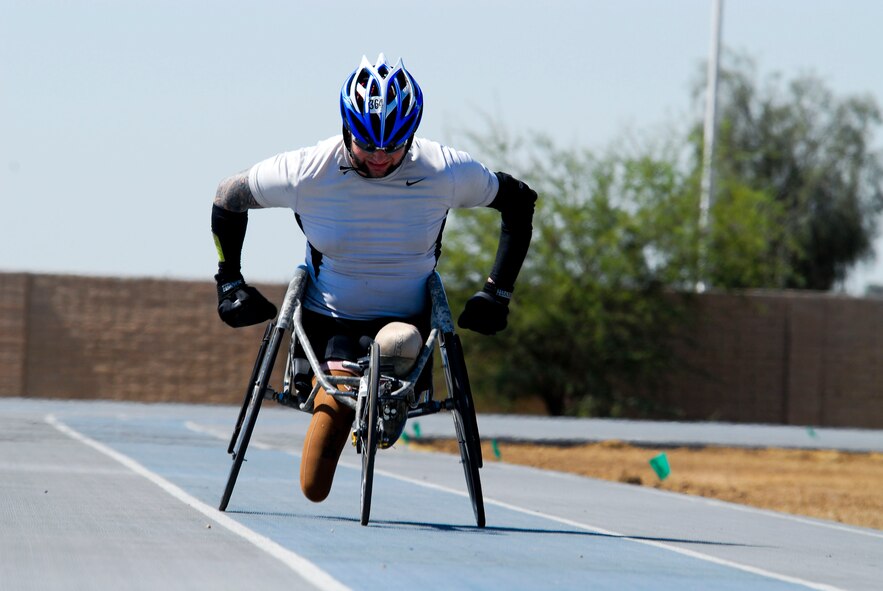 Retired Army Staff Sgt. Nick McCoy trains May 16 at the Luke softball field. McCoy competed in the 100-, 200- and 400-meter wheelchair sprints at the games. (U.S. Air Force photo/Senior Airman David Owsianka)