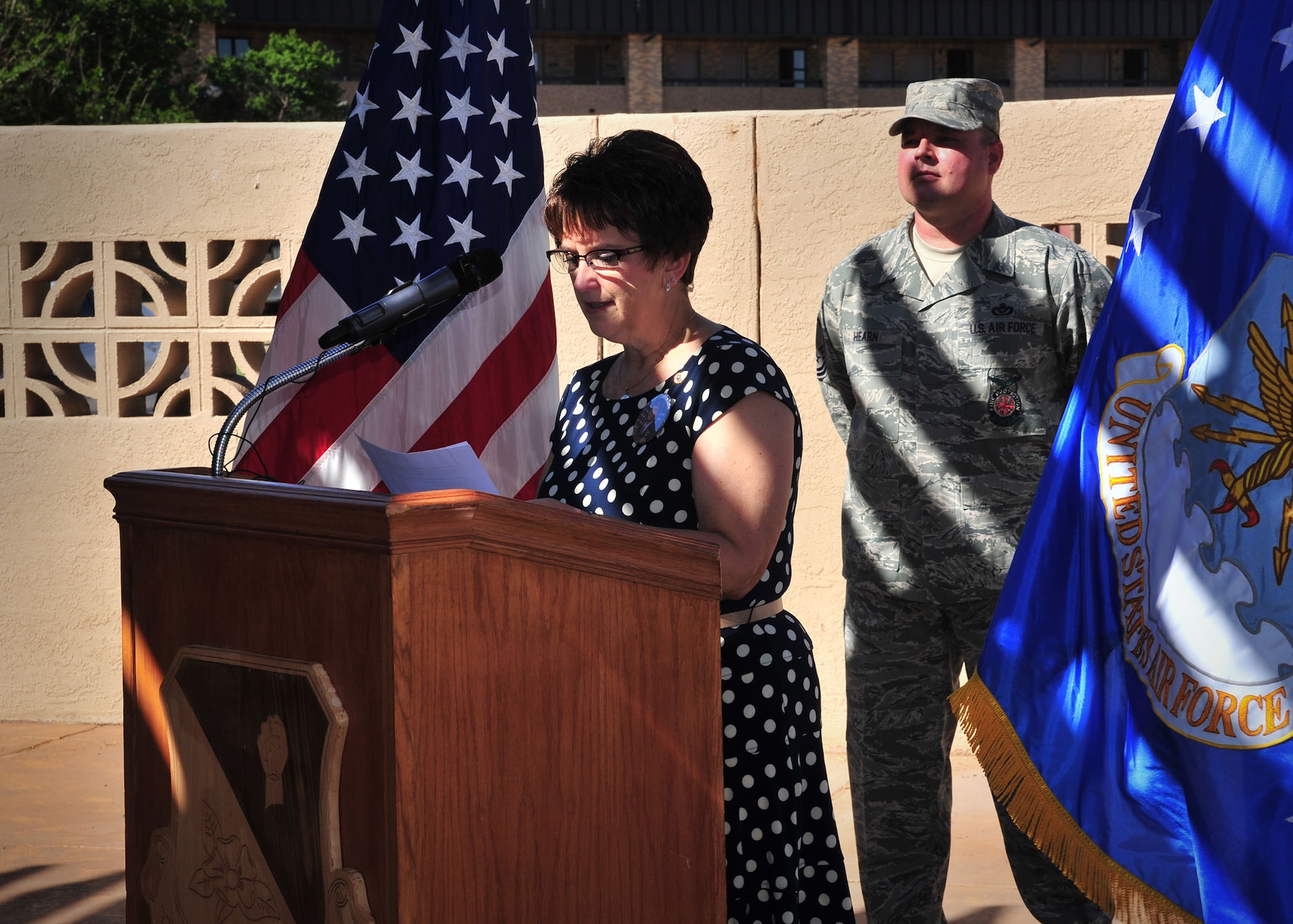 Susan Zerbe, mother of U.S. Air Force Tech. Sgt. Daniel L. Zerbe, speaks during a memorization ceremony for her son at the base pool at Cannon Air Force Base, N.M., May 27, 2013. The DZ Pool was named in remembrance of Zerbe, a pararescueman who formally served under Air Force Special Operations Command and perished in the line of duty. (U.S. Air Force photo/Senior Airman Alexxis Pons Abascal) 