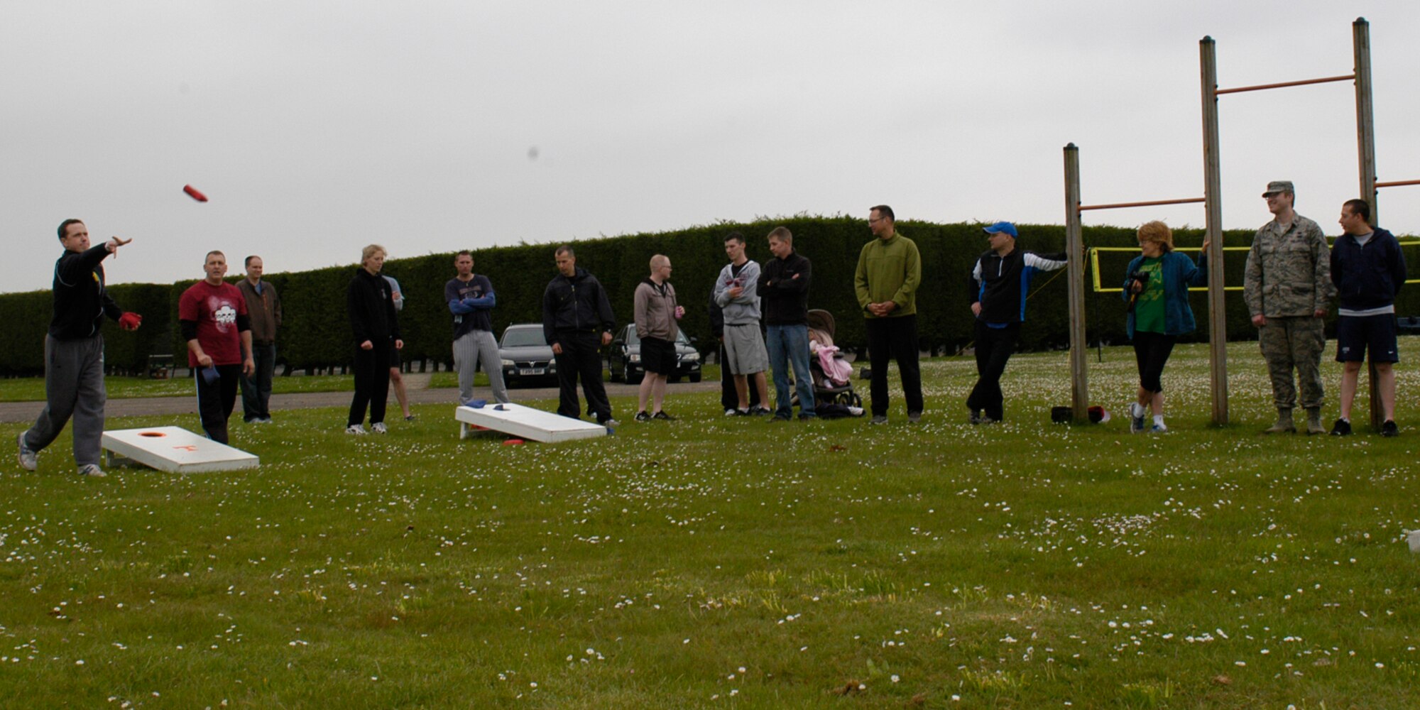 RAF ALCONBURY, United Kingdom – Members of the 501st Combat Support Wing staff participate in a corn-hole tournament during their Sports Day May 20. (U.S. Air Force photo by Tech. Sgt. Chrissy Best)
