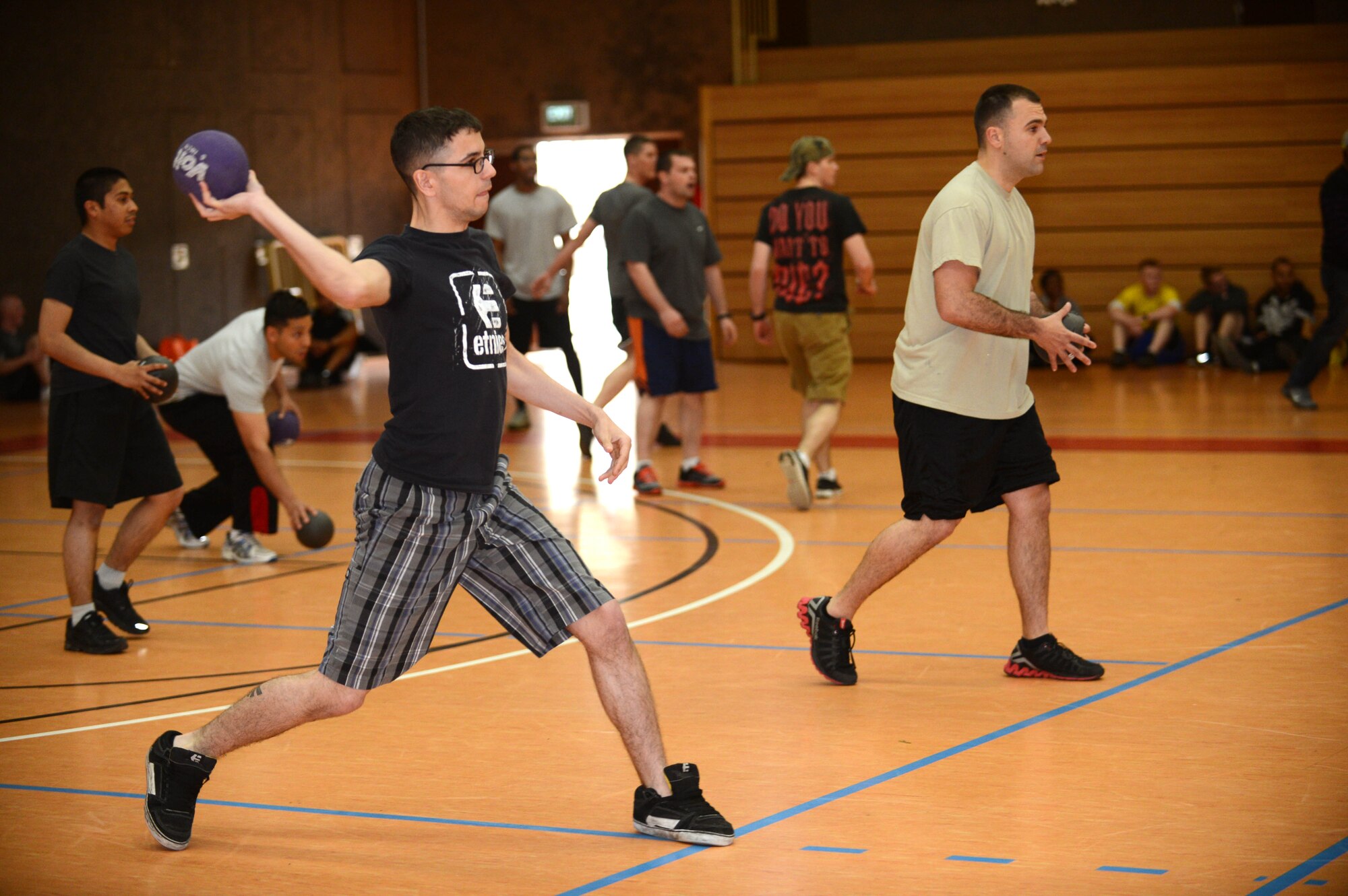 SPANGDAHLEM AIR BASE, Germany -- U.S. Air Force Airmen play dodge ball during a sports day competition May 30, 2013. Sports day brought the community together to increase moral and allow team building activities. (U.S. Air Force photo by Airman 1st Class Kyle Gese/Released)