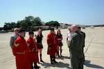 Cody Goetz (right), 560th Flying Training Squadron instructor pilot, gives Chelsea Pensioner ( from left to right) Donald crassweller, William Fox and David Thomson a guided tour of the 560th FTS May 16 at Joint Base - San Antonio-Randolph.  ( U.S. Air Force photo by Don Lindsey / Released)