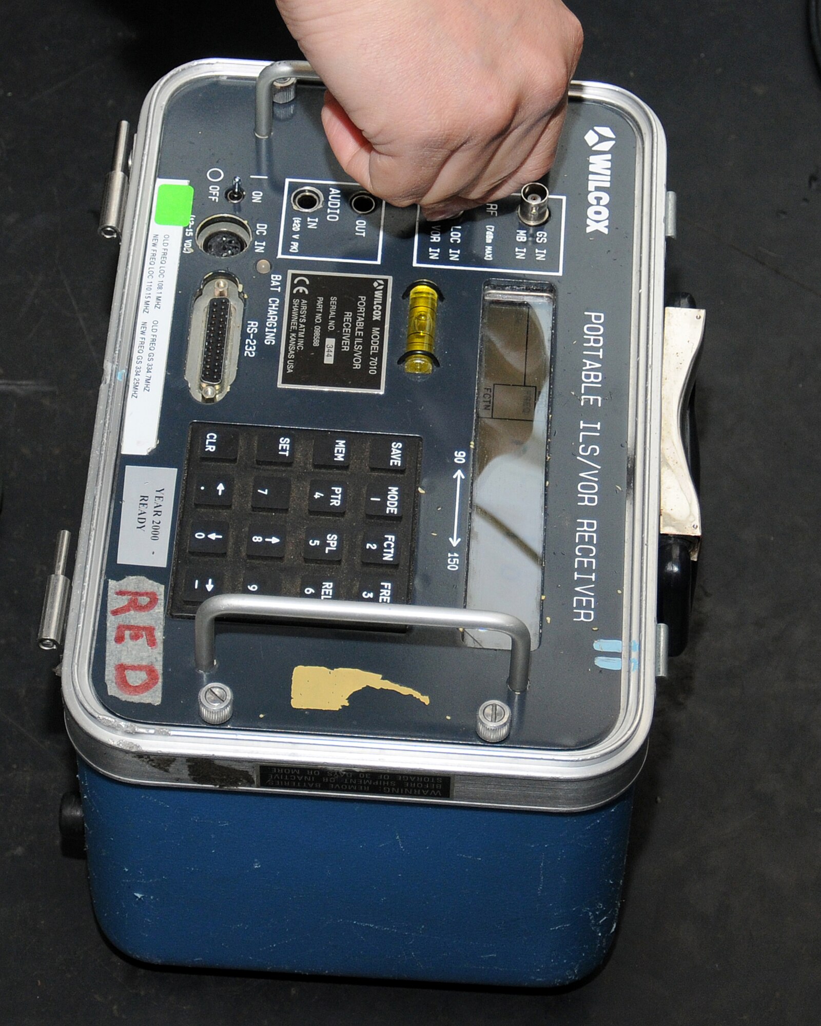 Staff Sgt. Sergio Santos, 100th Communications Squadron Airfield Systems team leader from Los Angeles, Calif., checks the modulation of the 29 localizer on a portable instrumental landing system receiver (system that provides precision guidance to an aircraft approaching and landing on a runway) May 24, 2013, on RAF Mildenhall, England. The shop sustains mission-critical air traffic control and landing systems, radios and weather equipment. (U.S. Air Force photo by Gina Randall/Released)